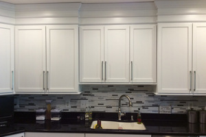 Refurbished Cabinets – From Stained To White